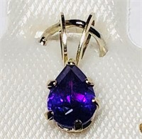 $100. 14KT Gold Amethyst Pendant