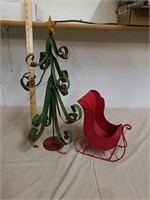 Decorative metal tree with metal sleigh