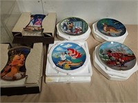 5 collectible Disney plates and one Norman