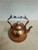 Copper teapot with porcelain handle