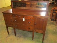 Buffet on legs, bevelled mirror backsplash