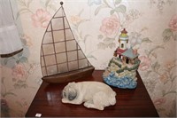 Sandicast bulldog figurine, wooden sailboat and