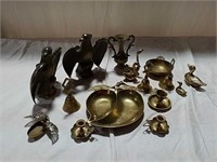 Brass vases, eagles, candlesticks and