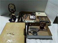 Old empty photo album, tuning fork, boxes