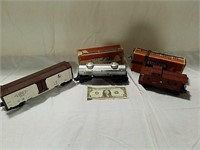 Vintage Lionel train cars some with boxes