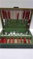 VINTAGE RED CUTLERY IN GREEN CASE