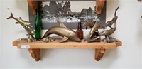 8Pc Brass Dolphins, Put-in-Bay print, shelf