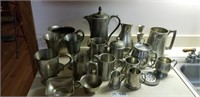 21pcs. Pewter mugs, candlesticks, pitcher