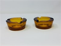 2 amber glass ashrays