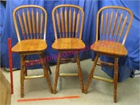 3 nice heavy oak swivel bar chairs