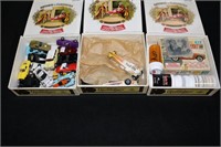 Three boxes toy racing supplies including one