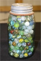 Ball Mason quart jar full of old marbles