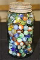 Ball quart jar full of old marbles