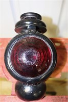 Antique carriage lamp with large red lense and