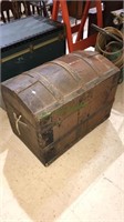 Antique humpback trunk with both handles and wood