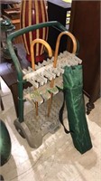 Tool rack on wheels, folding chair, pair of wood