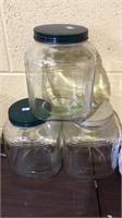 3 large glass storage jars  with tin lids, 12