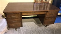 Formica top six drawer executive desk with pull