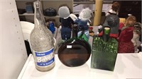 Three antique bottles including old cabin whiskey
