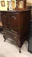 Cherry Queenanne bar cabinet with two doors over