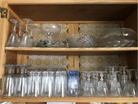 Cupboard Full of Glasses & Red Avon Glassware