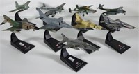 Nine various hand made model fighter aircraft