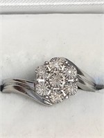$160. S/Silver 7 Diamond Ring