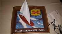 Stroh's beer sign with boat
