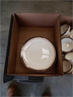 Box of plates by Ansley