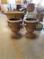Pair of fiberglass urns