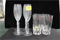 4 MILLENNIAL CHAMPAGNE FLUTES AND 4 TUMBLERS