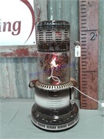 Kerosene heater w/ Christmas lights inside