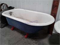 Blue claw-foot bathtub