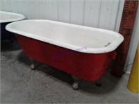 Red claw-foot bathtub
