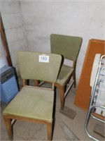 Two vintage wooden chairs w/ vinyl upholstery