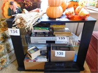 Black two shelf entertainment stand, 24"H x 33"W