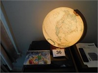 Replogle globe on wooden stand, lighted, works