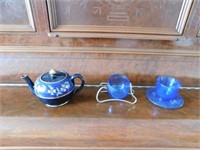 Dark blue hand painted teapot, gold accents,