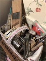 Basket of vintage kitchen utensils
