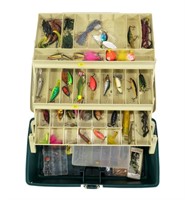 Plano tackle box with contents: plugs, worms, misc