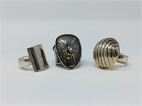 3 silver rings - some are stamped