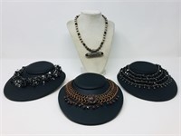 4 costume jewelry necklaces