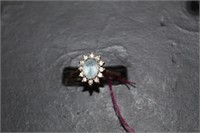 14kt Aqua Marine w/ 12 diamonds Ring