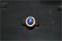 Blue Star Sapphire w/ 14 surrounded by 14