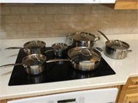 Six piece set of Lagostina cookware with lids.