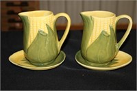 Two Shawnee Pottery Corn King creamers marked