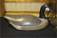 Wooden goose decoy with slightly turned head