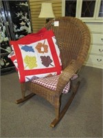 Wicker Rocking Chair and Handmade Quilt