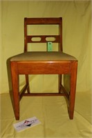 Chair with hidden drawer