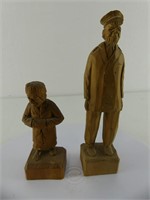 TWO SIGNED CARVED WOODEN FIGURES